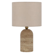 Livia travertine table lamp styled on a console in a modern living room