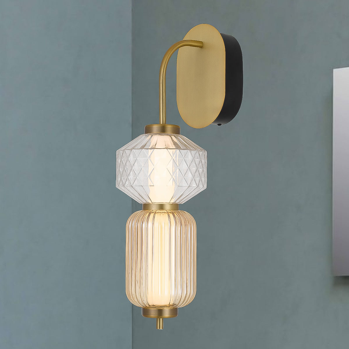 Torso LED Hourglass Wall Light with Polished Brass Finish